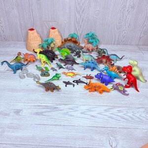 Toy lot of dinosaurs , trees , volcano’s and whales vintage and new play toys